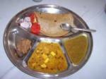 A normal thali (Indian plate) of Langar food in India